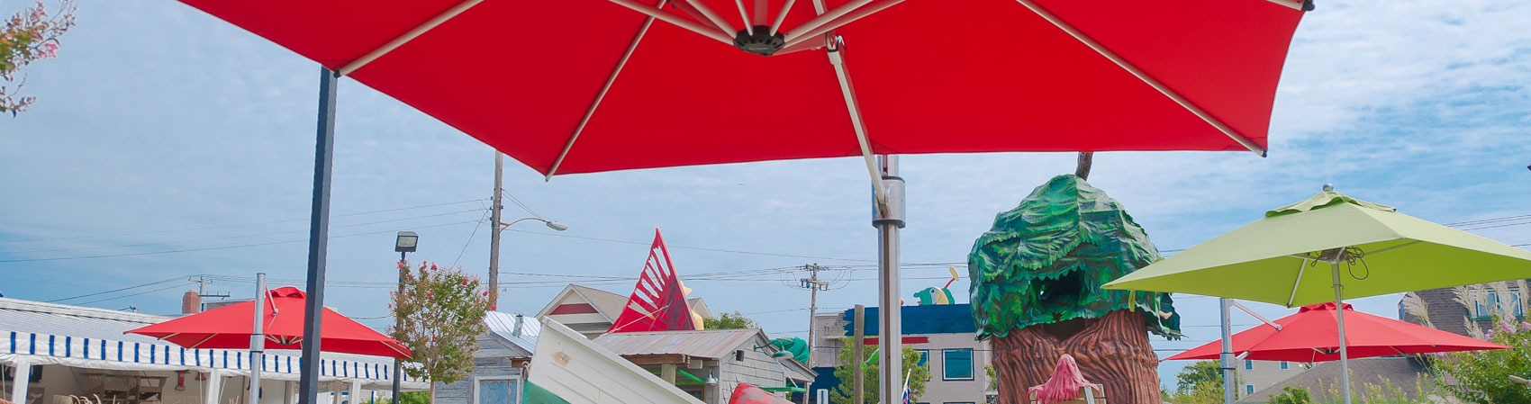 Frankford Recreation Umbrellas providing shade for a recreational mini golf course