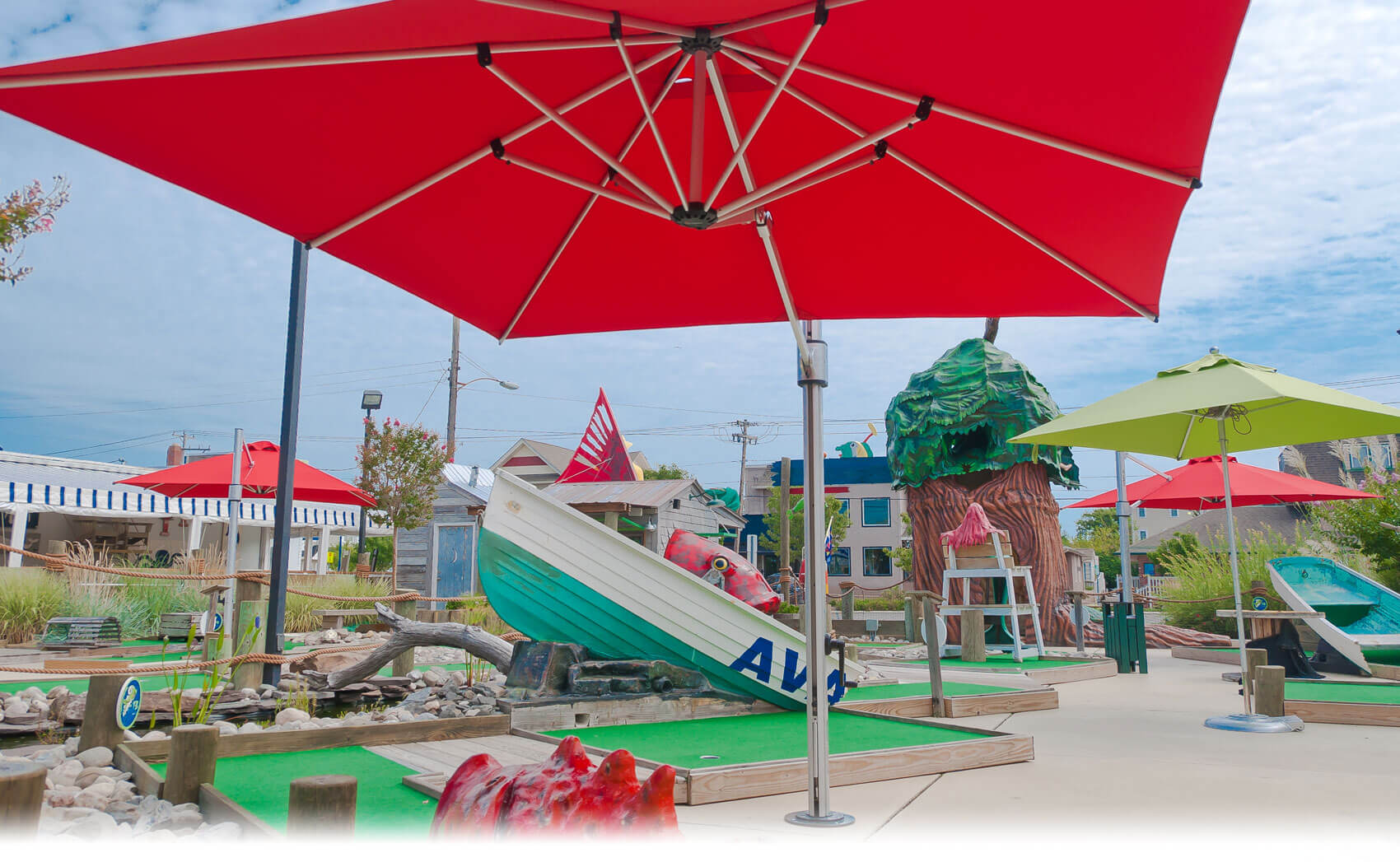 Frankford Recreation Umbrellas providing shade for a recreational mini golf course